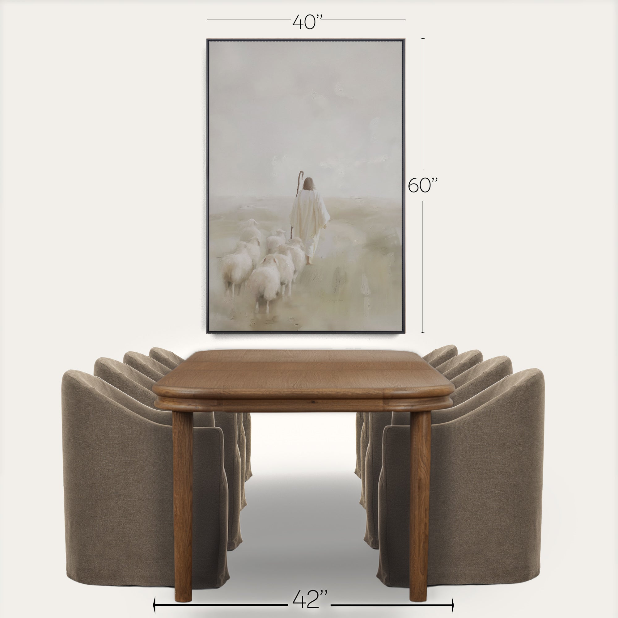 Wooden dining table with four curved brown chairs and a framed picture above on a white background 