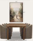 wooden dining table with four gray chairs and a landscape painting above on a white background 