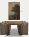 a framed landscape art print showing a tree and distant fields, displayed above a wooden dining table with upholstered chairs. white dimension lines and text indicate the print is 40 inches wide by 60 inches tall, with the table shown as 42 inches wide. 