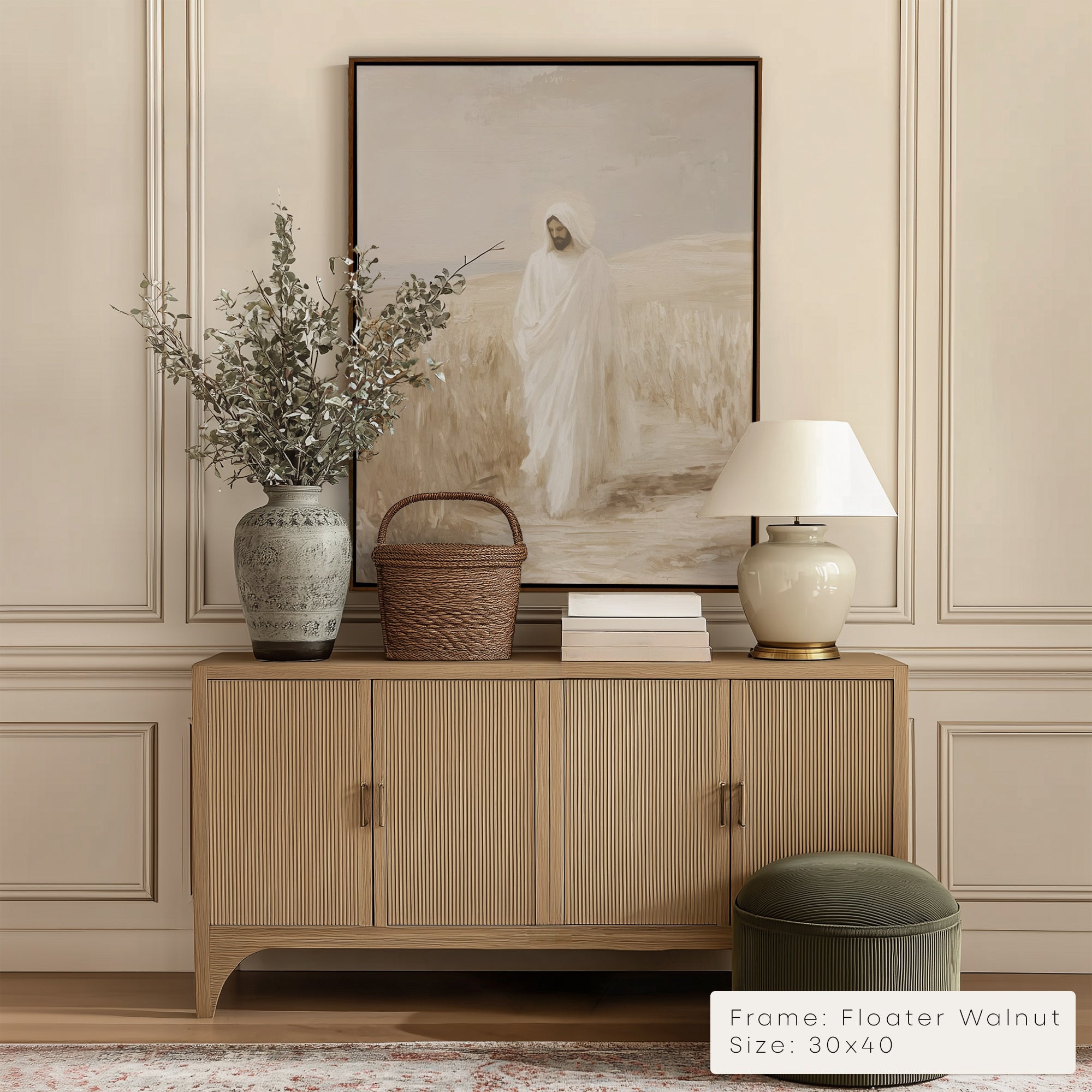 Wooden sideboard with decorative items against a wall with a framed abstract painting.