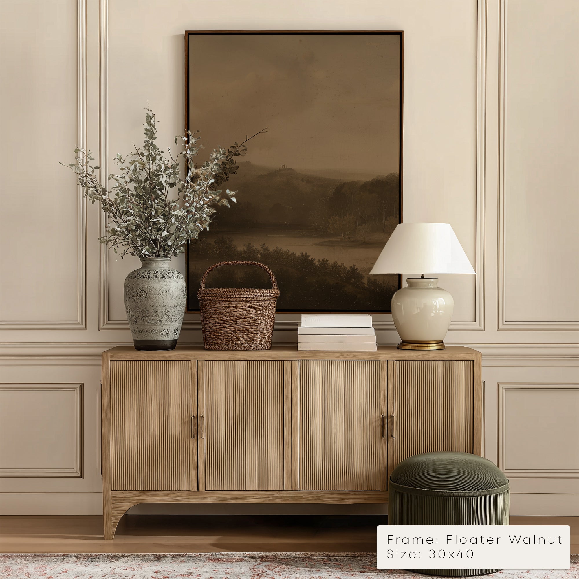 Wooden cabinet with decorative items against a wall with a framed landscape painting. __lifestyleImage