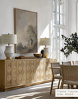 dining room with wooden sideboard, chairs, and large windows.