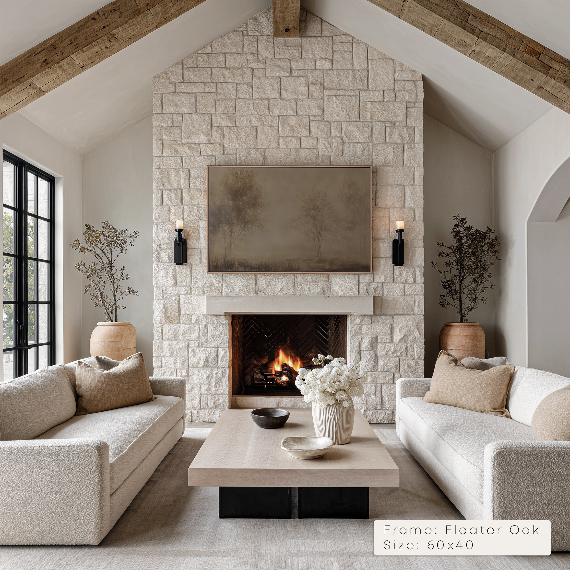 Living room with stone fireplace, white sofas, and decorative elements. __lifestyleImage