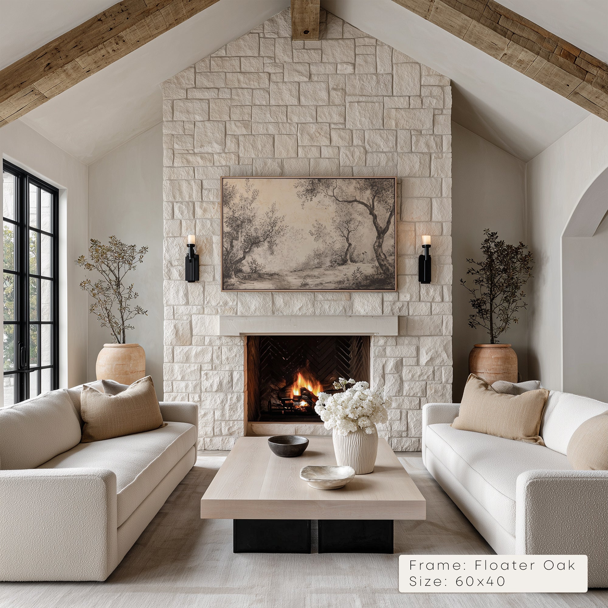 Living room with stone fireplace, white sofas, and decorative elements.