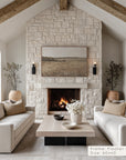 living room with stone fireplace, white sofas, and a coffee table.