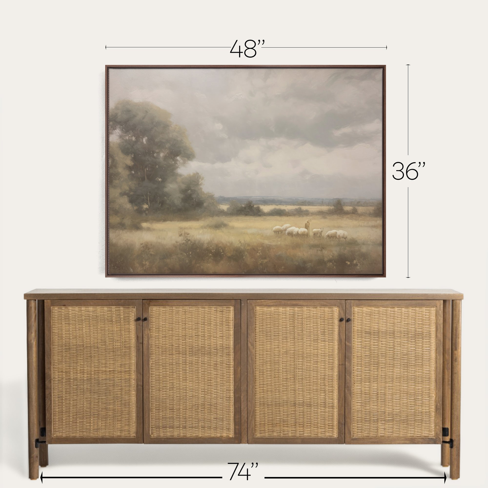 Wooden sideboard with wicker doors and framed landscape painting above it, with dimensions indicated. 