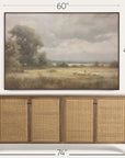 wooden sideboard with wicker doors and a framed landscape painting above it, showing dimensions. 