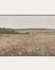 framed landscape painting of a field with trees and sky. 
