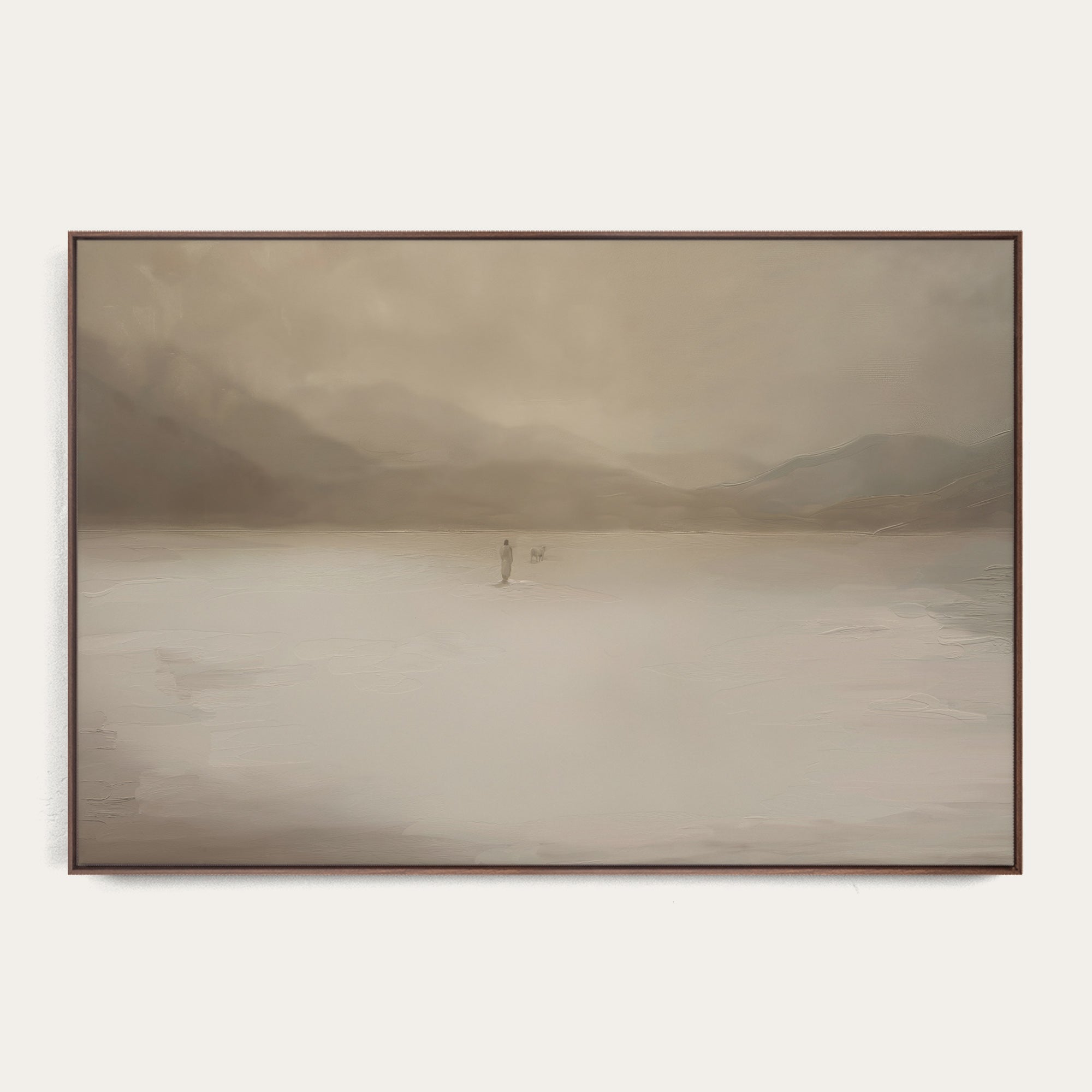 Framed artwork of a misty landscape with a figure on a path over water. 