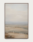 framed landscape painting of a rural scene with fields and a distant building. 