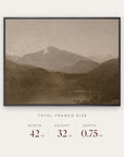 white mountains in a black floater frame with its total framed size listed below: 42 inches wide, 32 inches high, and 0.75 inches deep. 