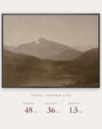white mountains in a black floater frame with its total framed size listed below: 48 inches wide, 36 inches high, and 1.5 inches deep. 