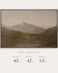 white mountains in a black floater frame with its total framed size listed below: 62 inches wide, 42 inches high, and 1.5 inches deep. 
