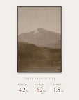 white mountains in a black floater frame with its total framed size listed below: 42 inches wide, 62 inches high, and 1.5 inches deep. 