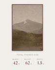 white mountains in a dark walnut floater frame with its total framed size listed below: 42 inches wide, 62 inches high, and 1.5 inches deep. 